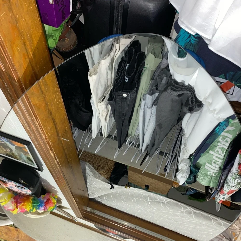Mirror that is odd shaped. It says 20x22 for sizing